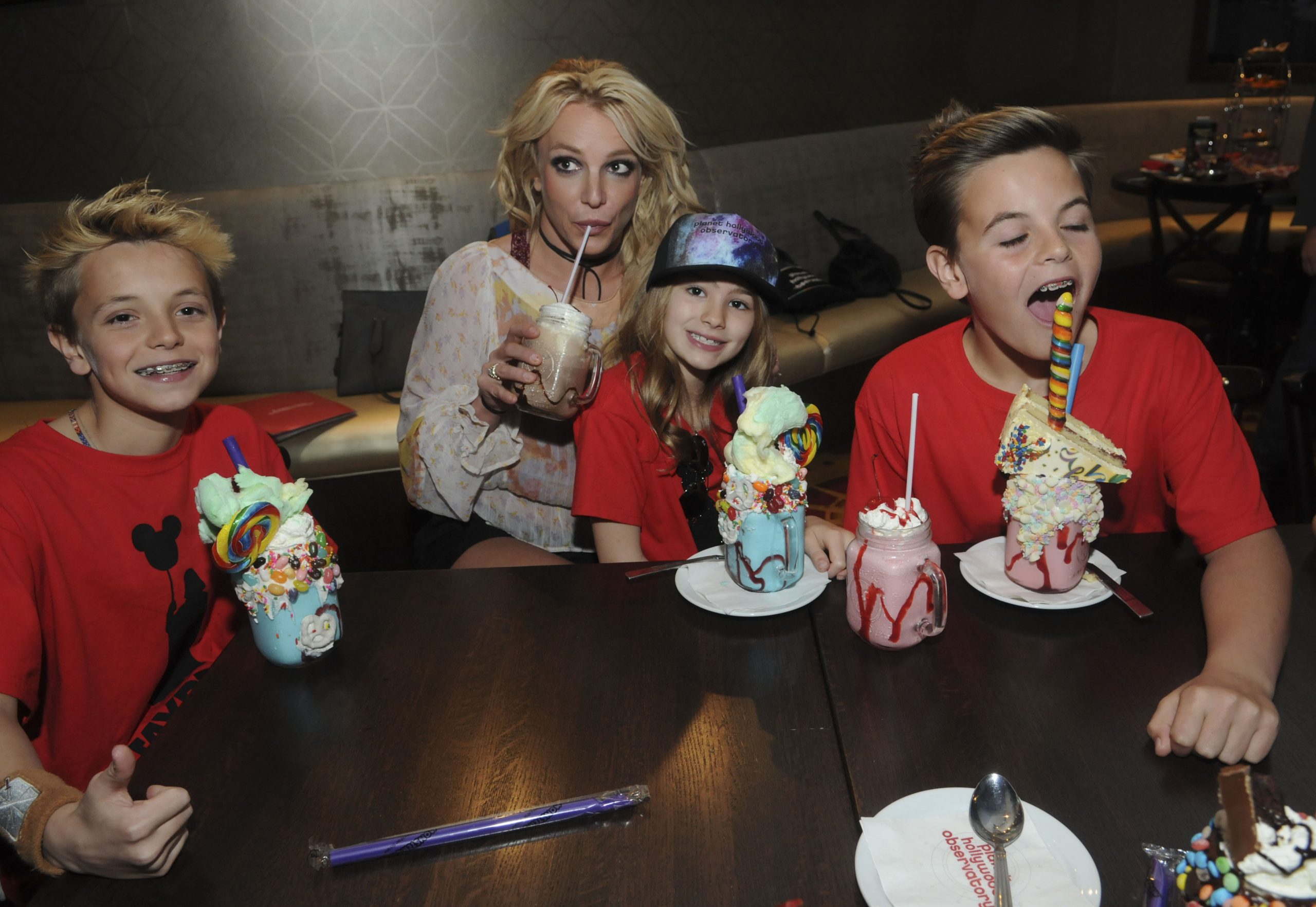 Britney Spears Enjoys A Family Outing At Planet Hollywood Disney Springs